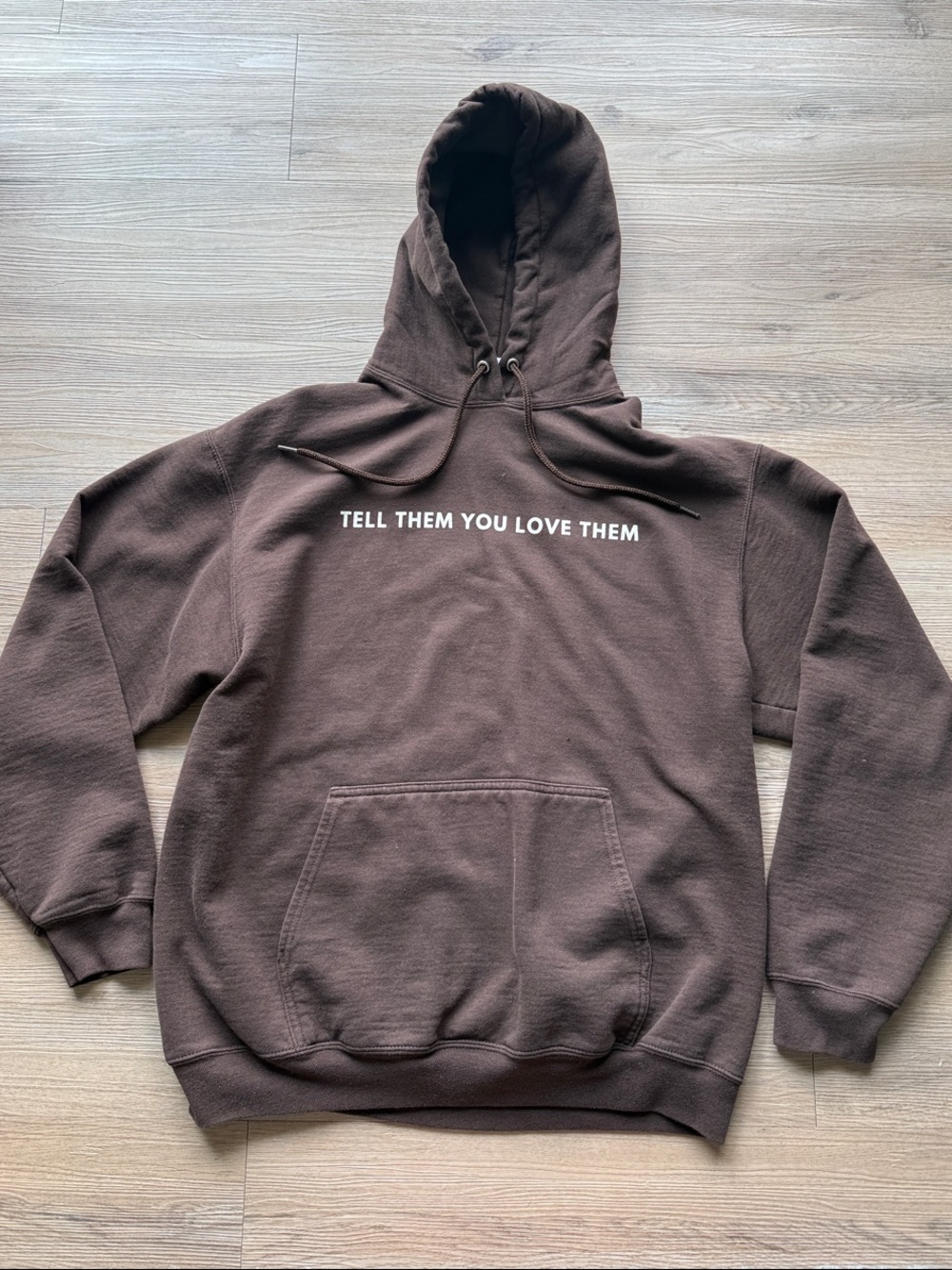 Brown Pullover Hoodie with "Tell Them You Love Them" Graphic